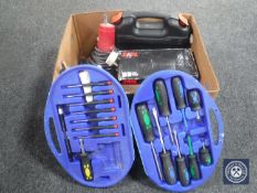A box of cased screwdriver set, cased Black & Decker multi-tool,