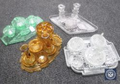 Four glass dressing table sets