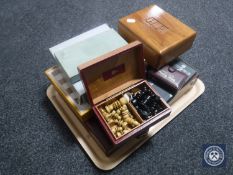 A tray of travel chess set, electronic chess set,