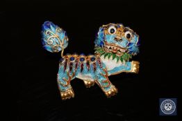 A silver gilt Chinese foo dog brooch