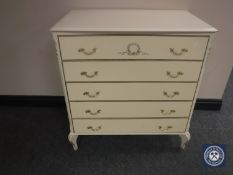 A white and gilt five drawer chest (leg damaged) CONDITION REPORT: Back-right leg