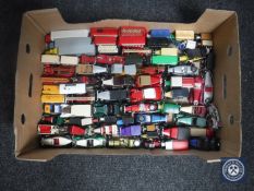 A box of unboxed die cast vehicles - classic cars and delivery vans