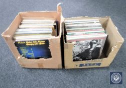 Two boxes containing LP's including Tom Petty, Graham Parker,