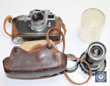 A Leica M2 961432 circa 1959, with Summicron 5cm f2 No 1579325, Elmar 90m f4 No 1713718.