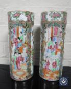 A pair of Canton porcelain cylindrical famille rose vases,