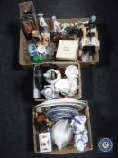 Three boxes containing novelty teapots, glassware, figurines, vintage soda siphon,