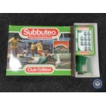 A boxed Subbuteo football game together with a further box of two football teams and accessories