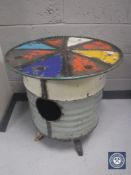 An oil drum occasional table