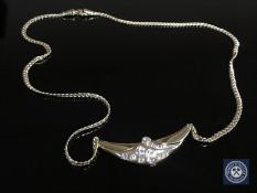 An 18ct gold diamond necklace, approximately 1.2 ct. 17.
