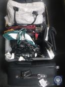 A box and a luggage case of assorted hand bags