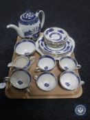 A tray containing a twenty-one piece Royal Cauldon dragon tea service together with a Willow