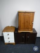 A pair of bedside cabinets together with a further pine bedside cabinet and a pine three-drawer