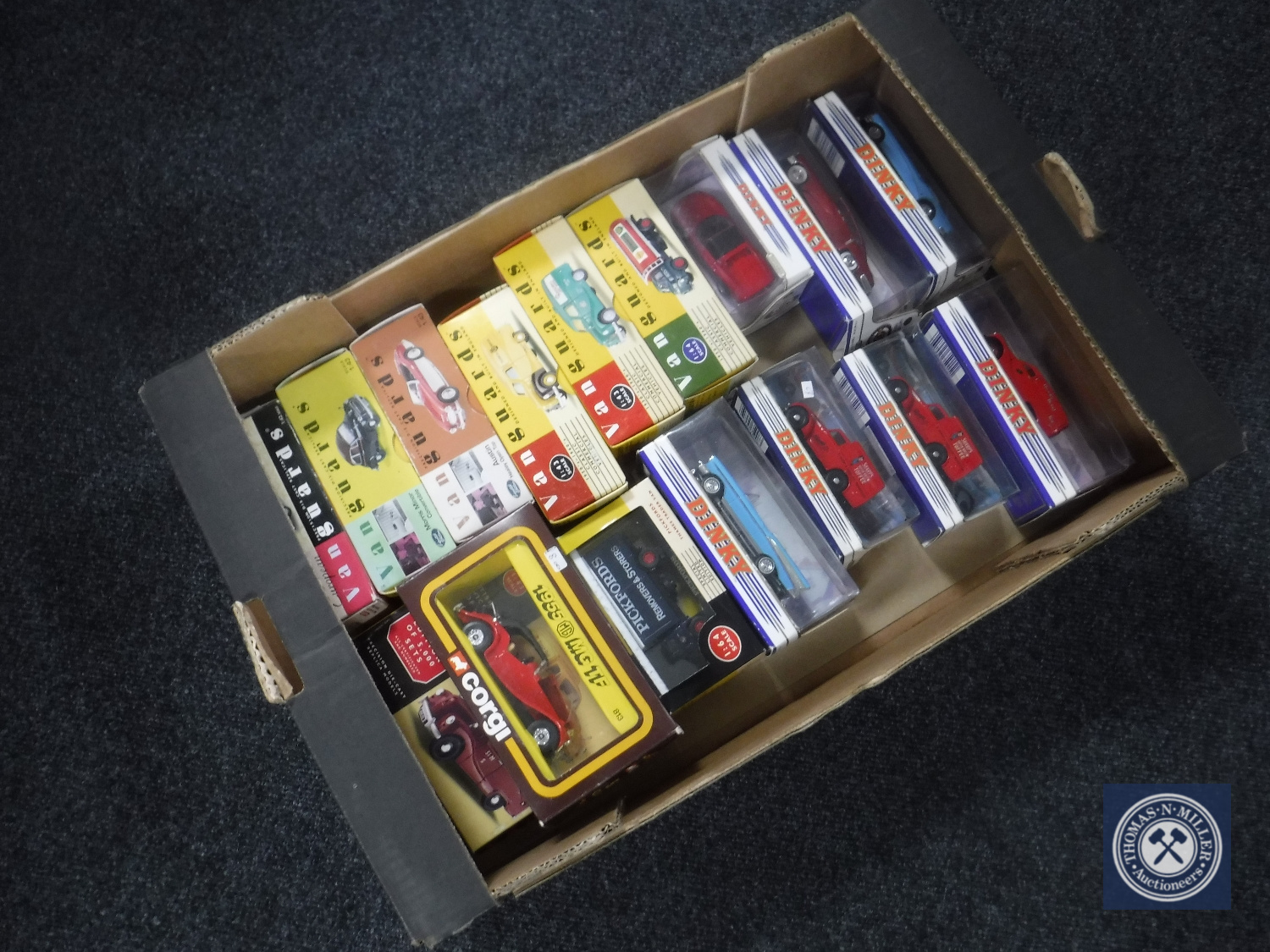 A box containing boxed 20th century die cast vehicles including Dinky,