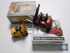 Four vintage die cast fork lift trucks - two Dinky 401 (one boxed),