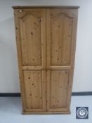 A pine double door wardrobe