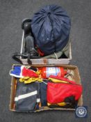 Two boxes containing fire extinguisher, snorkeling equipment, sleeping bag,