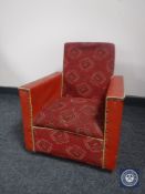 A mid 20th century red vinyl child's chair