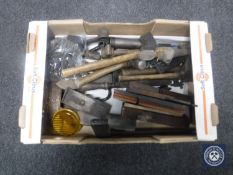 A box of a quantity of woodworking planes, joinery tools,