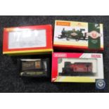 A box containing three boxed Hornby engines together with a boxed Graham Farish carriage