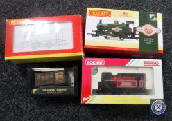 A box containing three boxed Hornby engines together with a boxed Graham Farish carriage