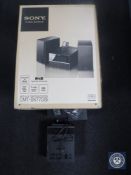 A boxed Sony micro hi/fi component system and a pair of boxed Panasonic SB-CH33 speakers