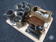 A tray of pewter tankards, vintage mincer, vintage hole punch,