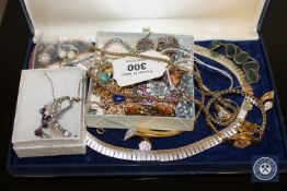 A collection of costume jewellery, lady's wrist watch, gilt metal chain, brooches etc.