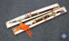Two boxed Chinese tourist Lungchuan swords