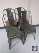 Two pairs of French style metal cafe chairs