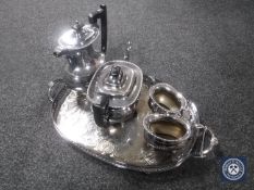 A four-piece Viners plated tea service on twin-handled serving tray