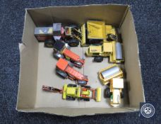 A box containing eight 20th century Dinky and Corgi toys die cast farm vehicles