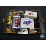 A box of a quantity of boxed die cast vehicles including Corgi, Maisto,