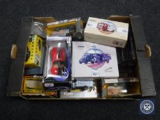 A box of a quantity of boxed die cast vehicles including Corgi, Maisto,