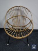 A mid 20th century wicker and bamboo chair