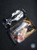 A box of Scalextric accessories, control power pack,