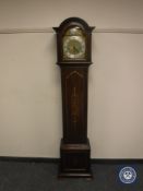 A good quality Edwardian inlaid mahogany grandmother clock with brass and silvered dial,