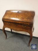 A 19th century Dutch rosewood and floral marquetry bureau,