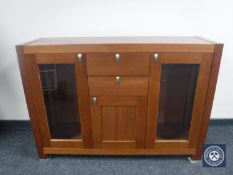 A contemporary sideboard in a pine finish