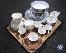 Twenty pieces of Royal Doulton dinner ware, Susie Cooper coffee cans and saucers,