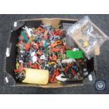 A box containing mid 20th century and later plastic soldiers including Timpo toys,