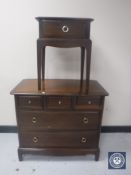 A Stag Minstrel five drawer chest and a bedside stand
