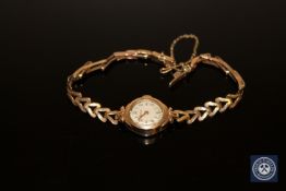 A 9ct gold lady's wrist watch, 10.4g.