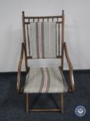 An early 20th century folding chair