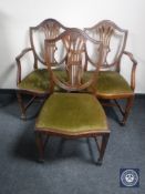 Eight mahogany shield back dining chairs