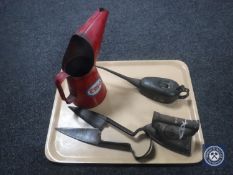 A tray of vintage Esso oil can, one other, flat iron,