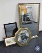 A gilt framed bevelled overmantel mirror together with an octagonal brass framed mirror,