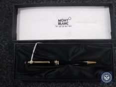A Mont Blanc ball point pen, in retail box with personal guide.