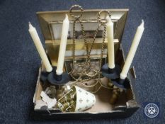 A box of four gilt framed prints, metal candle sconces,