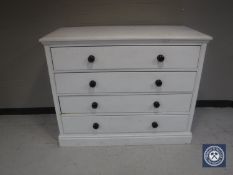 A painted pine four drawer chest