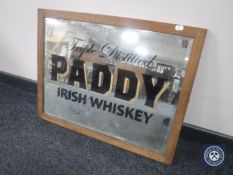 A 20th century mirror bearing "Paddy Irish Whiskey"